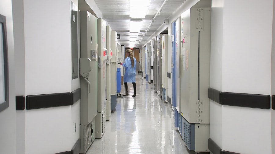 Nurse walking down a bright hospital hallway