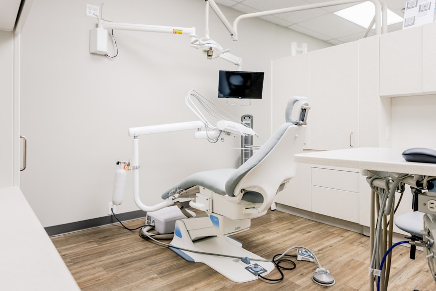 Dental treatment room with a patient chair and overhead light